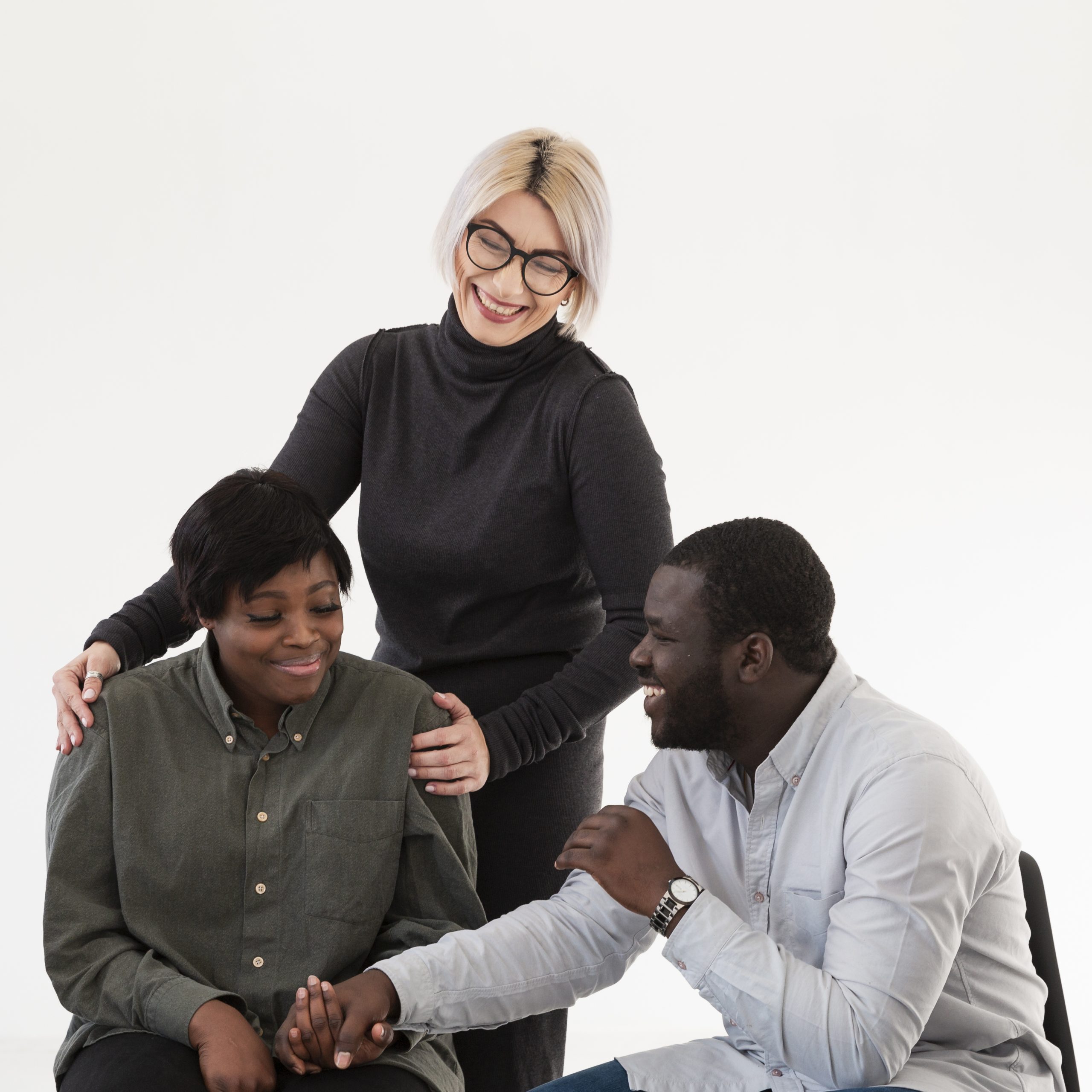 smiling-doctor-consoling-lovely-couple